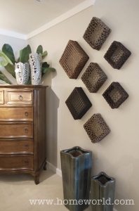 Filling an empty wall with baskets add dimension, texture, and interest.