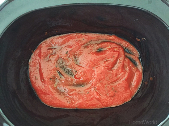 Add just enough marinara sauce to cover bottom of crock pot. This will keep the noodles from sticking to the pot.